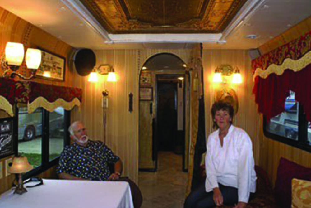 Jimmy and Sadie in the parlor (view looking rearward)