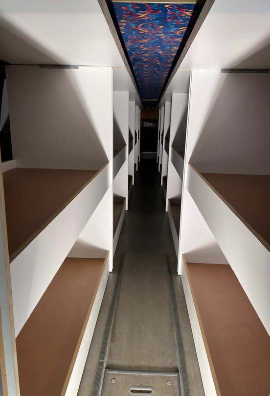 Interior view of the bus during the conversion process. 