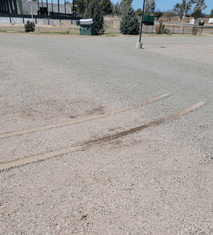 Skid marks were left behind from a toad being dragged.