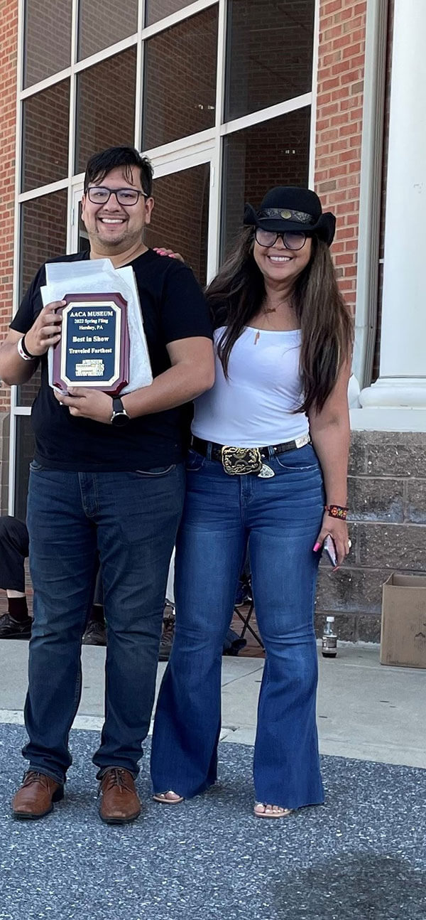 The Parra family receiving one of the three awards won.