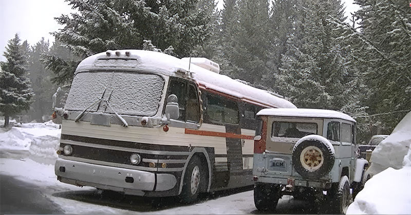 Photo of the bus and toad parked at Yellowstone National Park.