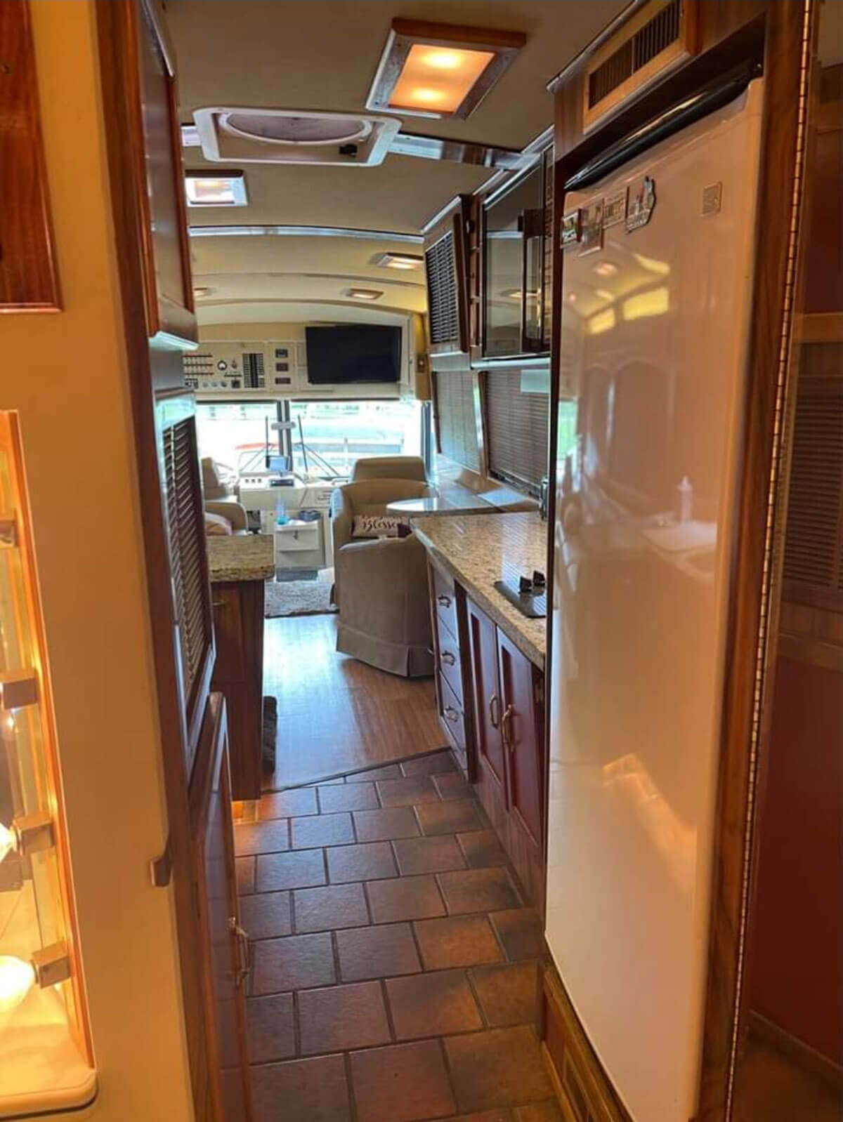 This image has an empty alt attribute; its file name is Apartment-size-Kenmore-refrigeratorfreezer.jpg