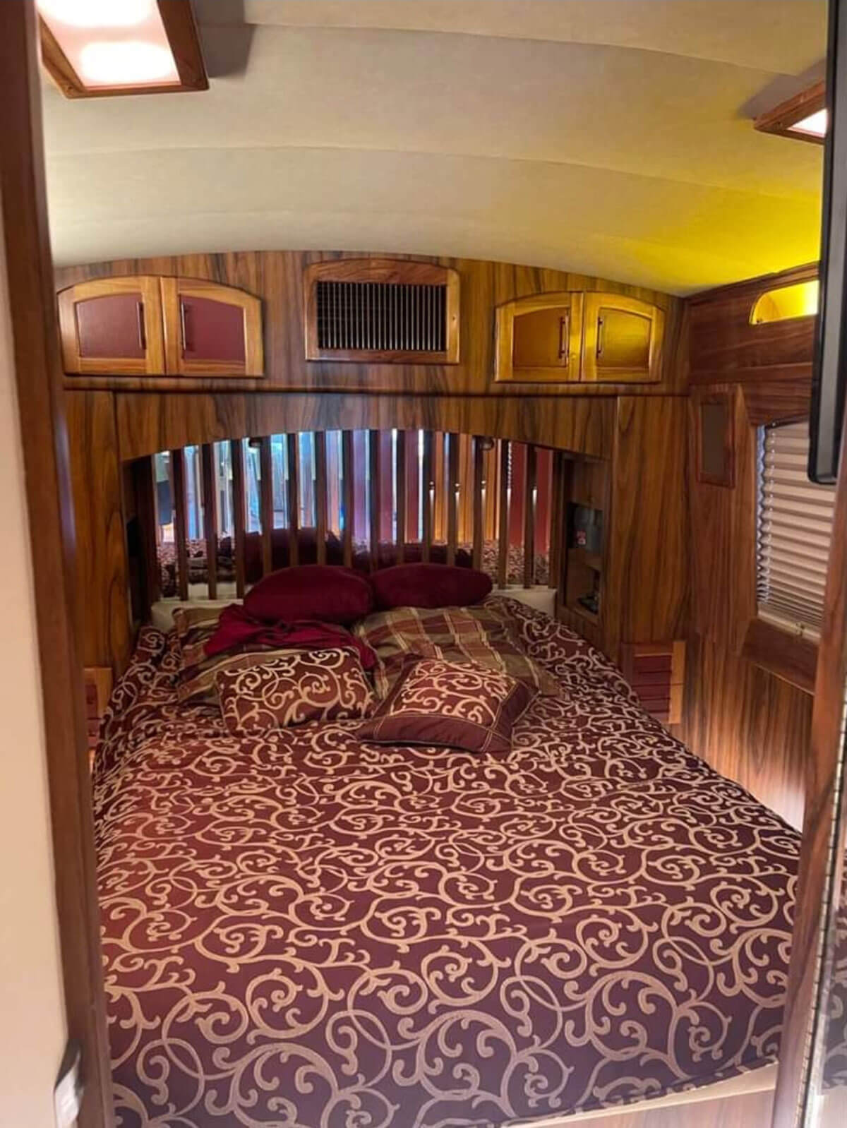 This image has an empty alt attribute; its file name is Queen-size-underlit-bed.-There-is-a-lot-of-hidden-storage-in-this-room.jpg