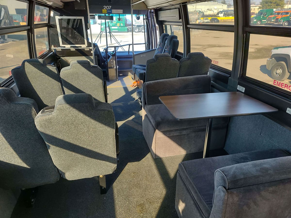 Looking forward: seats, table, and carpeting installed.