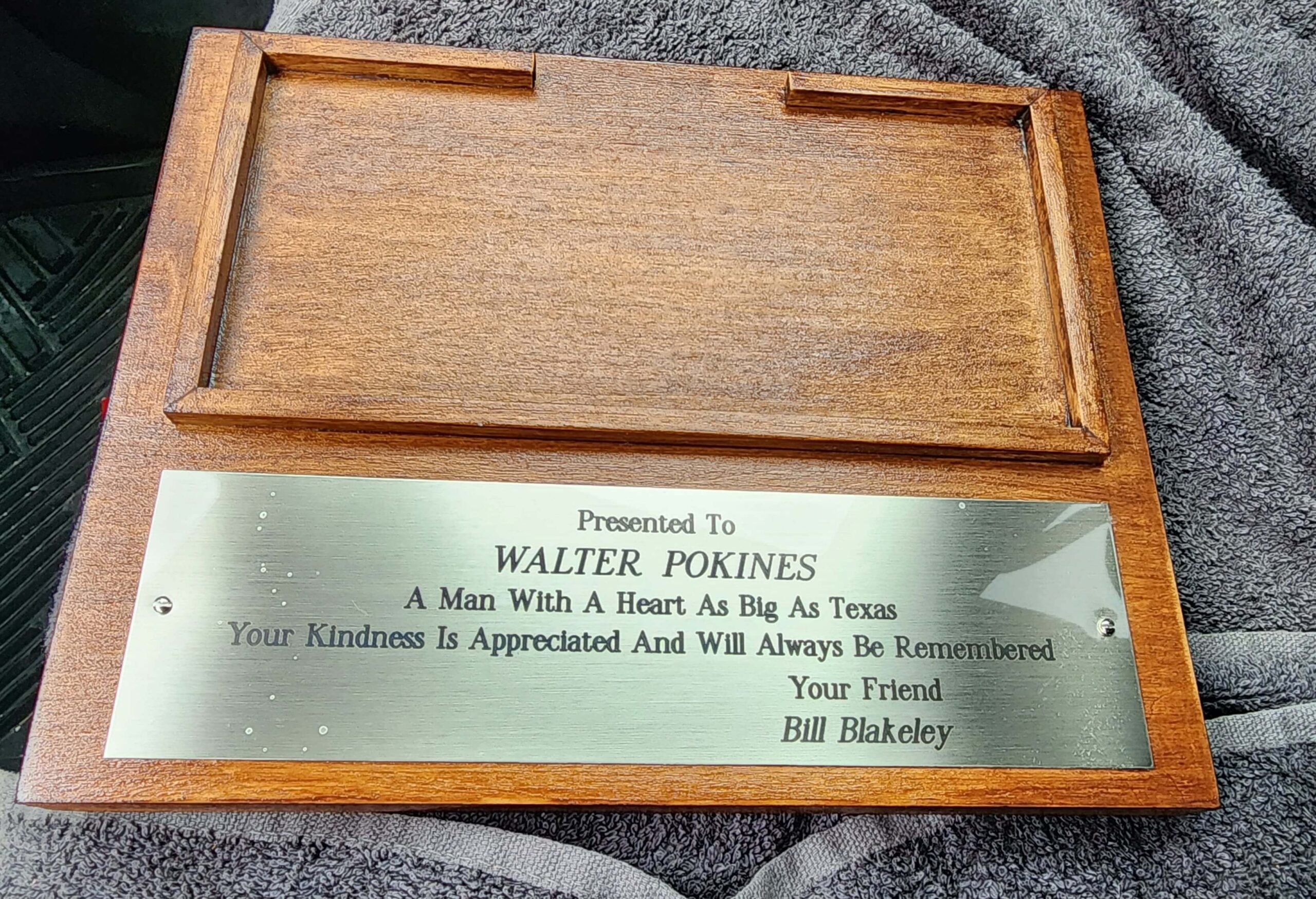 This is the trophy that I had made for Walter. I made the base myself and had a placard made with a few nice words on it to him.