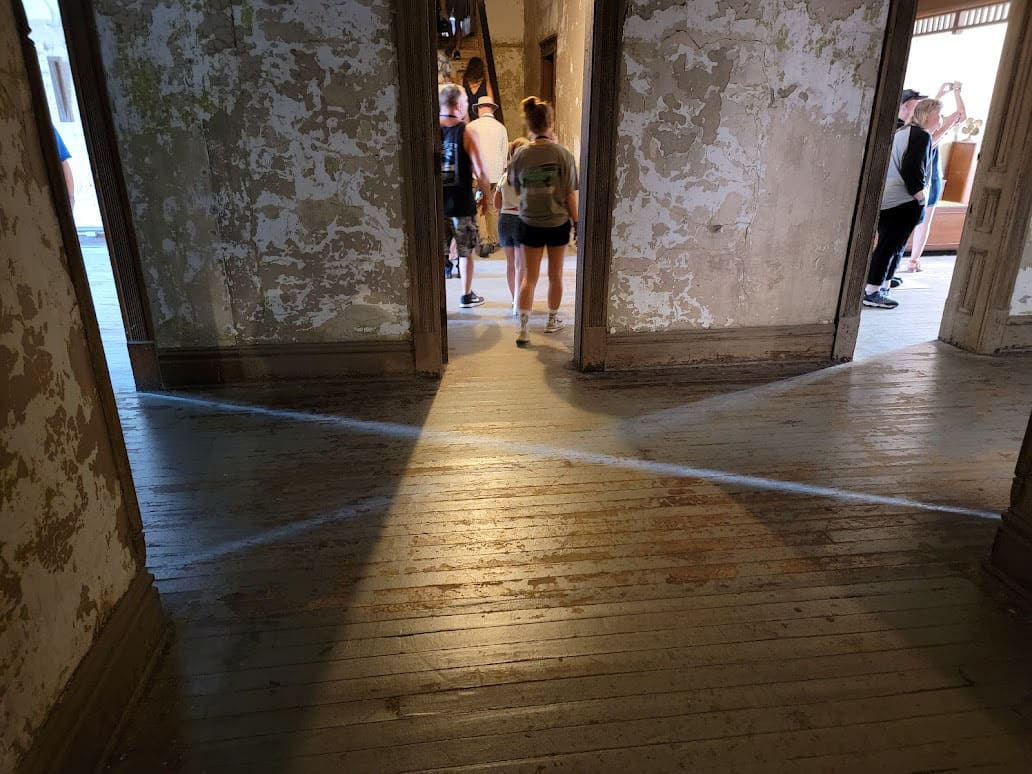 The architecture is such that sunlight shines through four doorways to create a perfect cross on the floor in one of the halls.