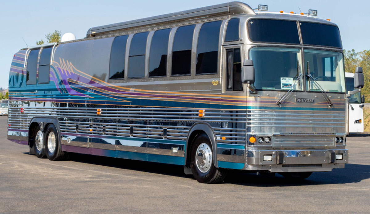 This 1998 Marathon Prevost bus conversion is typical of high-end conversions. Notice there are windows on the side in the front living area and one on each side in the bedroom area and notice how they curve up around the roofline at the top to add to the styling.