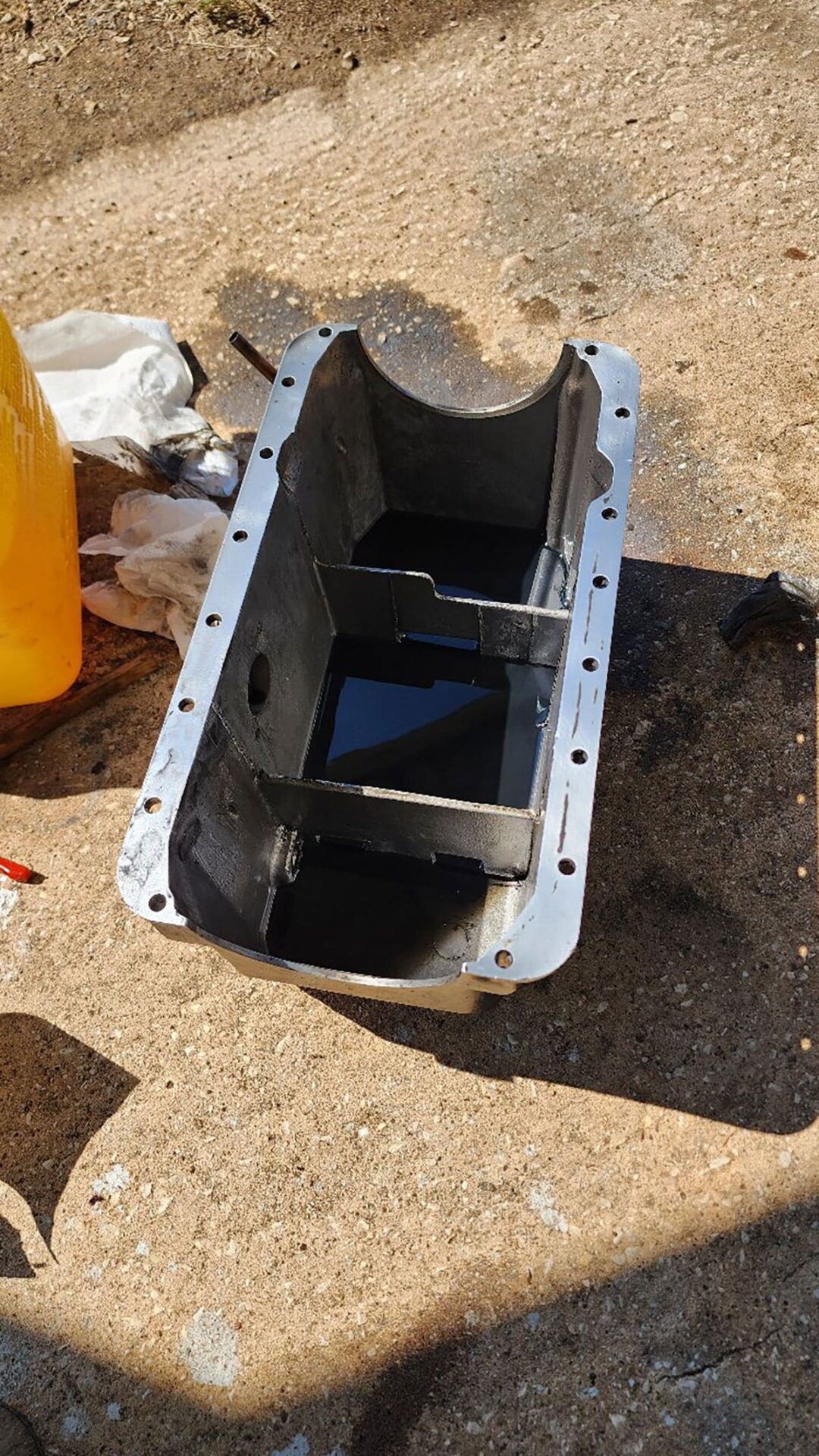 We cleaned the old gasket off the Perkins oil pan.