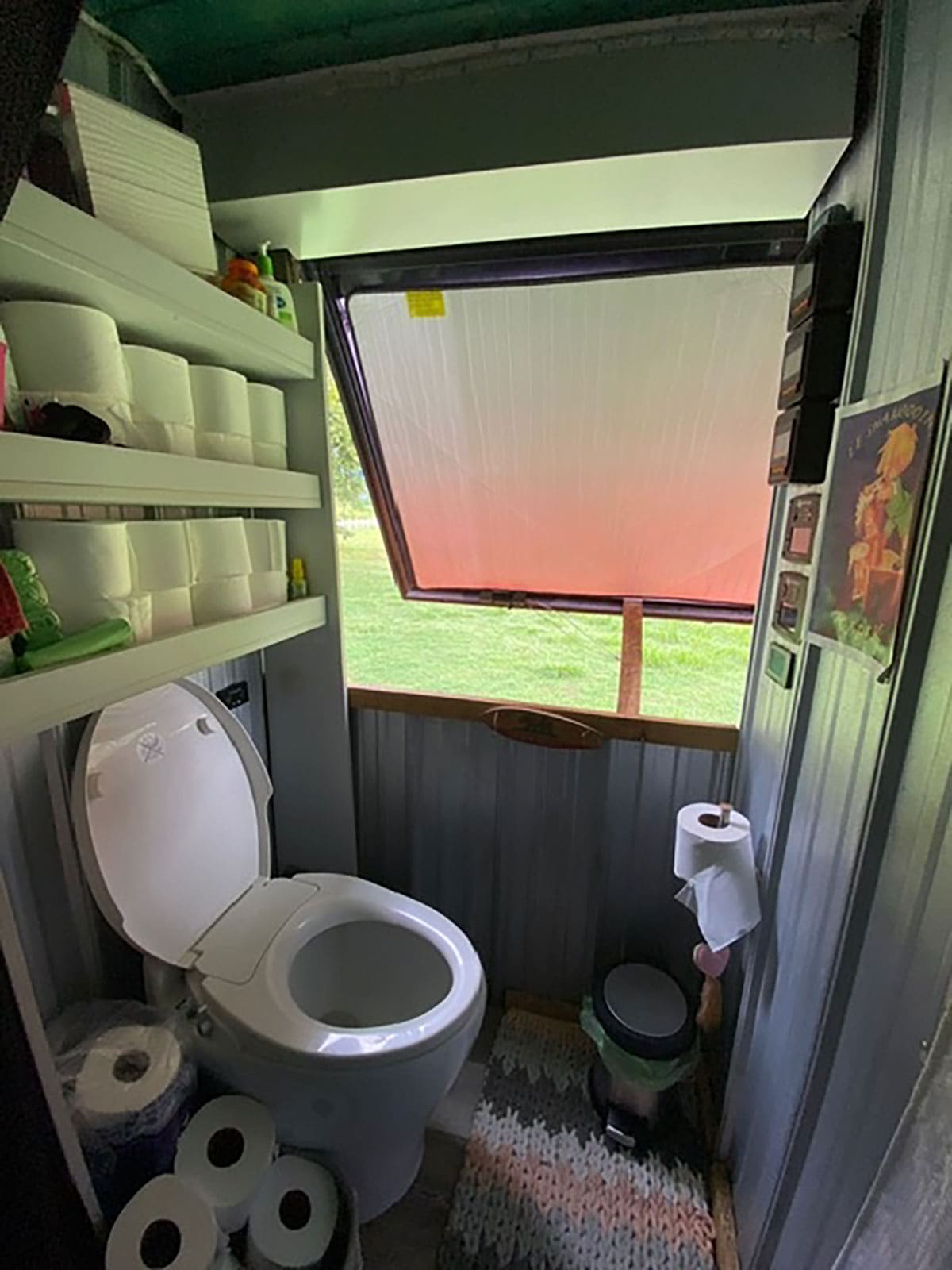 The bathroom, with its spacious shower and bidet-equipped toilet, provides a touch of luxury on the road. 