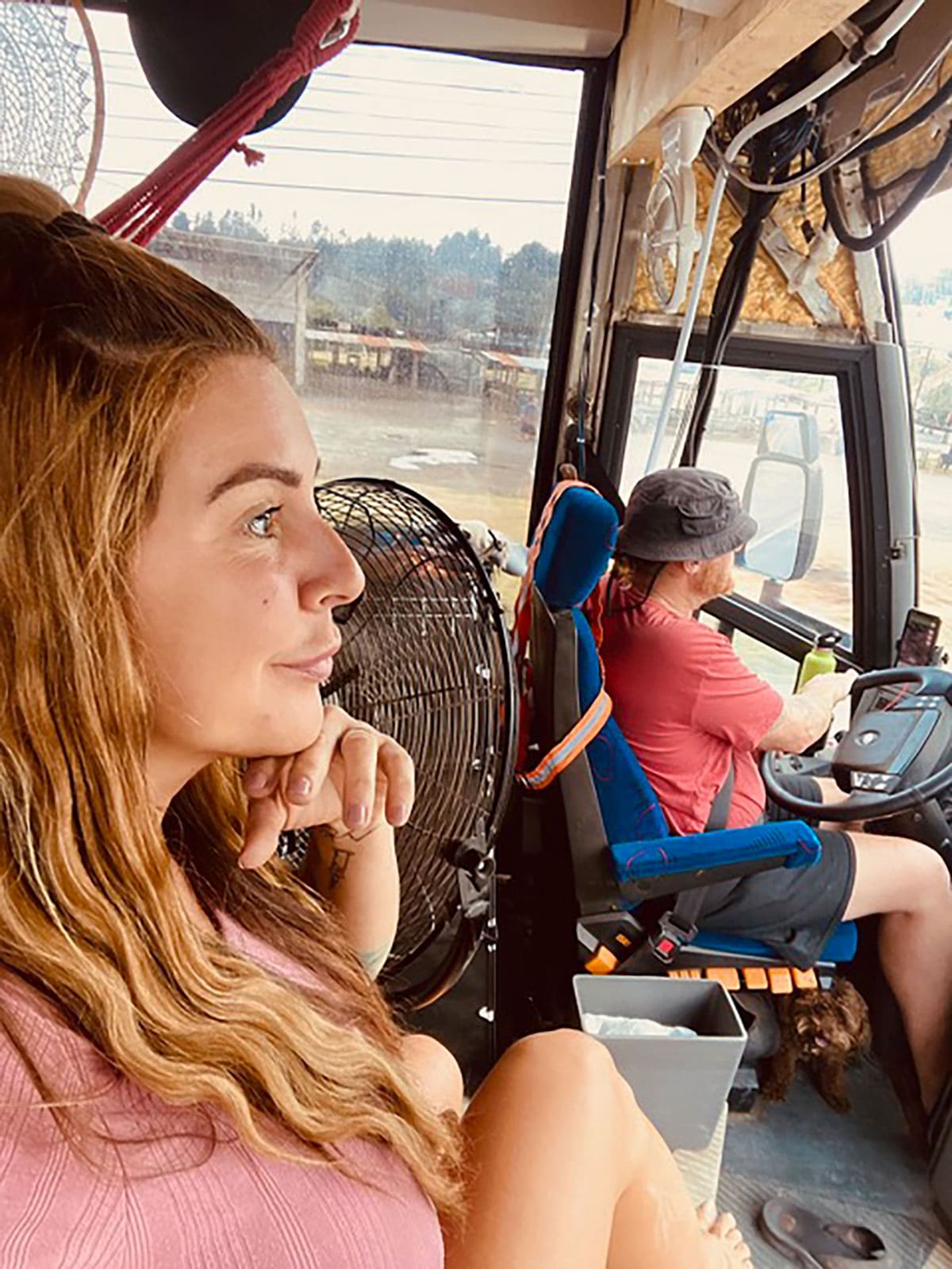 We don't have air conditioning when we drive, so we need several fans to keep us cool.